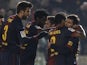Messi is congratulated by teammates after his early Copa Del Rey strike against Cordoba on December 12, 2012
