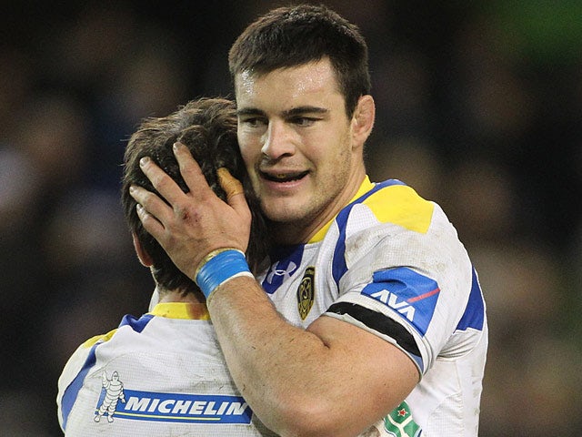 Clermont Auvergne's Loic Jacquet and Morgan Parra celebrate their win against Leinster on December 15, 2012