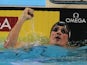 Ryan Lochte punches the air after breaking the another world record on December 15, 2012