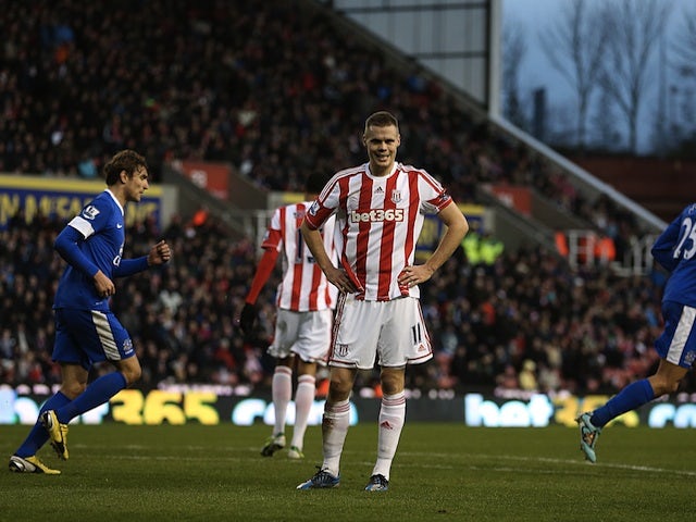 Stoke captain Ryan Shawcross stands dejected after his own goal for Everton on December 15, 2012