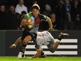 Harlequins Sam Smith runs on to score a try against Zebre on December 15, 2012