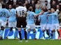 City players congratulate Sergio Aguero on his early goal versus Newcastle on December 15, 2012