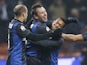 Inter forward Antonio Cassano celebrates with teammates after his goal against Verona on December 18, 2012