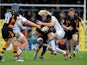 Wasps' Christian Wade is tackled by Sale Sharks' Richie Grey in a game on December 23, 2012