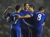 Chelsea's Fernando Torres is congratulated by team mates after scoring his team's fifth goal against Leeds on December 19, 2012