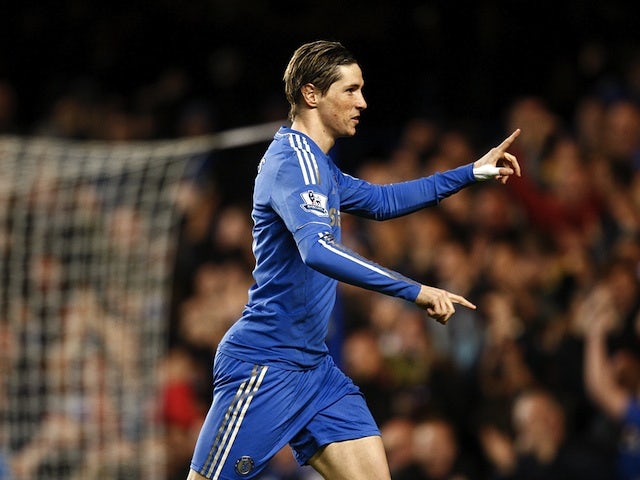 Chelsea's Fernando Torres celebrates his early goal against Aston Villa on December 23, 2012