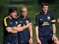 Barca coach Jordi Roura (left) with a club physio and manager Tito Villanova at training on July 17, 2012