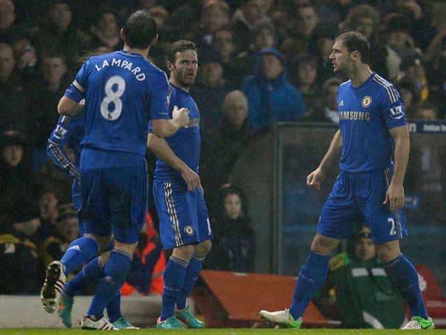 Chelsea's Juan Mata is congratulated by team mates after scoring the equaliser against Leeds on December 19, 2012