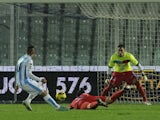 Pescara's Mervan Celik scores the opening goal against Catania on December 21, 2012