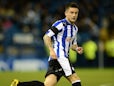 Sheffield Wednesday's Rhys McCabe in action against Huddersfield in November 2011