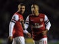 Striker Theo Walcott celebrates wrapping up the points for Arsenal against Reading December 17, 2012
