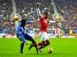Arsenal's Theo Walcott is fouled by Wigan's Jean Beausejour in the penalty area on December 22, 2012
