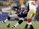 Patriots QB Tom Brady is sacked during defeat to the 49ers on December 16, 2012