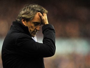 Mancini laments "incredible" timing