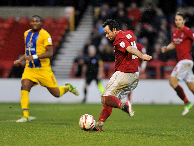 Nottingham Forest's Andy Reid strikes the ball to score the equaliser against Crystal Palace on December 29, 2012