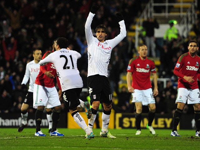 Byran Ruiz celebrates his goal with Kerim Frei against Swansea on December 29, 2012