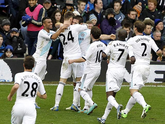 Frank Lampard is congratulated by team mates after scoring the equaliser just before half time against Everton on December 30, 2012