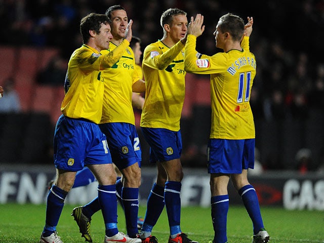 Stephen Elliott is congratulated by team mates after scoring his second goal on December 29, 2012
