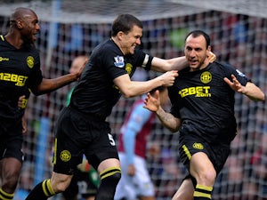 Wigan lead Villa at break