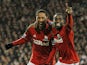 Jonathan de Guzman is congratulated by team mate Nathan Dyer after scoring his team's second goal on December 29, 2012