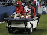 San Fran receiver Mario Manningham is removed from the field after injuring his knee against Seattle on December 23, 2012