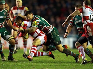 Gloucester Rugby's Martyn Thomas is tackled by Leicester Rugby's Niall Morris on December 29, 2012
