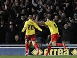 Matej Vydra is congratulated by team mate Troy Deeney after scoring his team's second goal on December 29, 2012