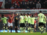 Newcastle players protest their controversial second goal against Man Utd at Old Trafford on December 26, 2012