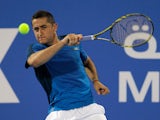 Nicolas Almagro returns the ball during the World Tennis Championship final against Novak Djokovic on December 29, 2012