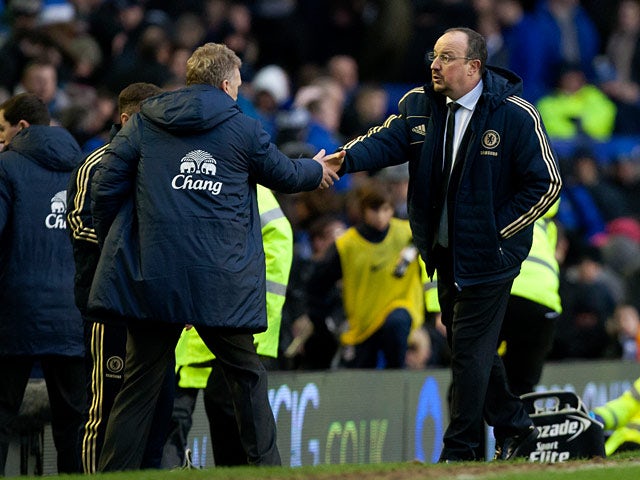 Chelsea interim manager Rafa Benitez and Everton manager David Moyes shakes hands at the end of their match on December 30, 2012
