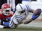 Colts WR Reggie Wayne scrambles for extra yardage against the Chiefs on December 23, 2012