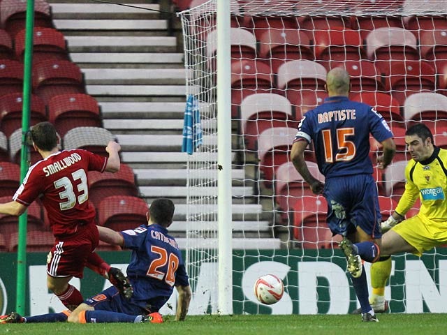 Middlebrough's Richard Smallwood scores his team's second goal on December 29, 2012