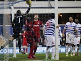 QPR keeper Rob Green flicks the ball into his own net against West Brom on December 26, 2012
