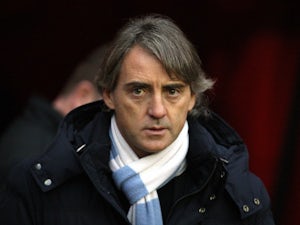 Mancini blames strikers for loss