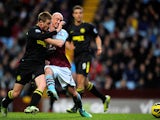 Aston Villa's Stephen Ireland and Wigan's James McCarthy battle for the ball on December 29, 2012