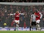 Theo Walcott celebrates after scoring his second against Newcastle on December 29, 2012
