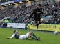 Hibernian's Tim Clancy slides in to win the ball from Celtic's Georgios Samaras on December 29, 2012