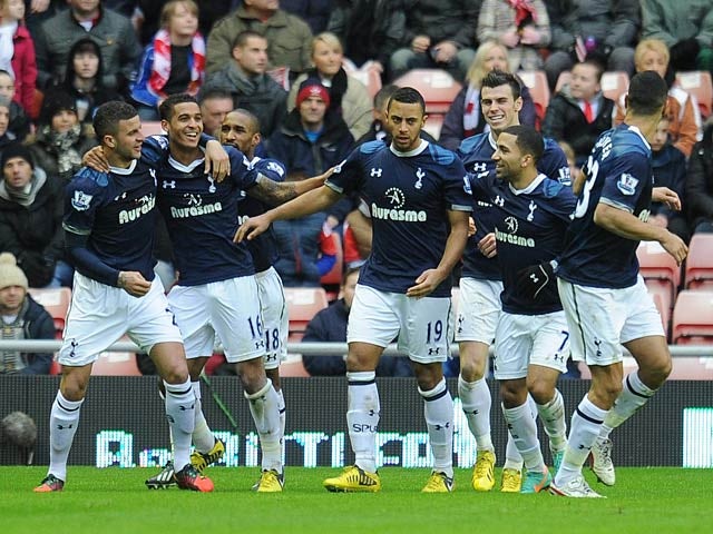 Aaron Lennon is congratulated by team mates after scoring the winning goal against Sunderland on December 29, 2012