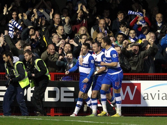 Reading striker Adam Le Fondre is congratulated by teammates following a goal against Crawley on January 5, 2013