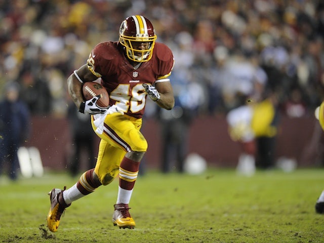 Skins RB Alfred Morris carries the ball against Dallas on December 30, 2012