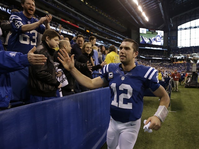 Colts QB Andrew Luck greets fans after beating the Texans on December 30, 2012