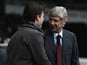Arsenal manager Arsene Wenger is greeted by Swans boss Michael Laudrup before the FA Cup tie on January 6, 2013