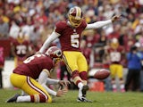 Billy Cundiff of the Washington Redskins takes a kick in a game on October 7, 2012
