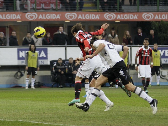 Milan striker Bojan scores a goal against Siena on January 6, 2013