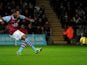 Villa striker Christian Benteke scores a penalty against Swansea on January 1, 2013