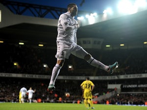 Spurs forward Clint Dempsey celebrates a goal against Reading on January 1, 2013