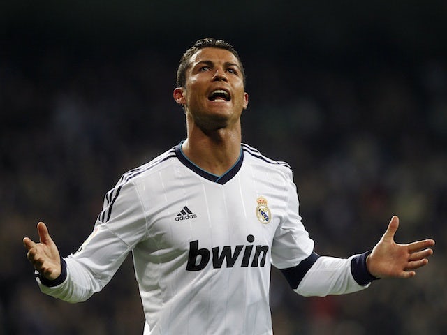 Ronaldo hat-trick fires Real into quarters