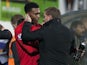 Liverpool boss Brendan Rodgers congratulates Daniel Sturridge following a goalscoring debut at Mansfield on January 6, 2013