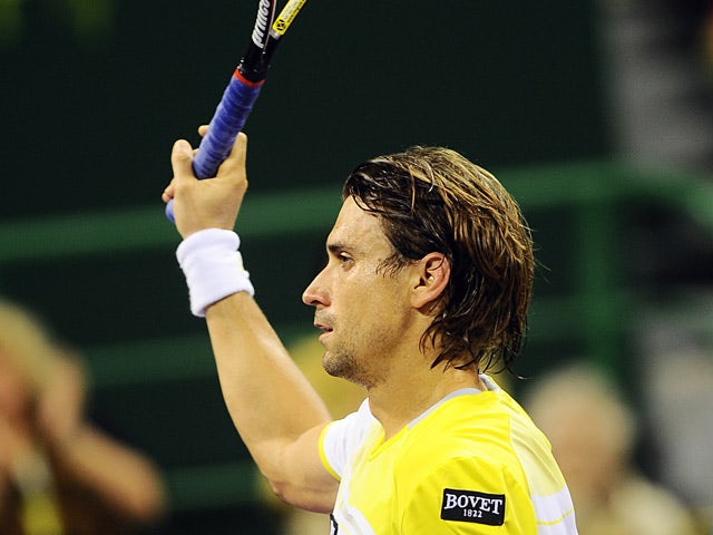 David Ferrer celebrates his win over Paolo Lorenzi in the Qatar Open on January 3, 2013
