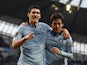 City's Gareth Barry is congratulated by David Silva after scoring the second against Watford on January 5, 2013